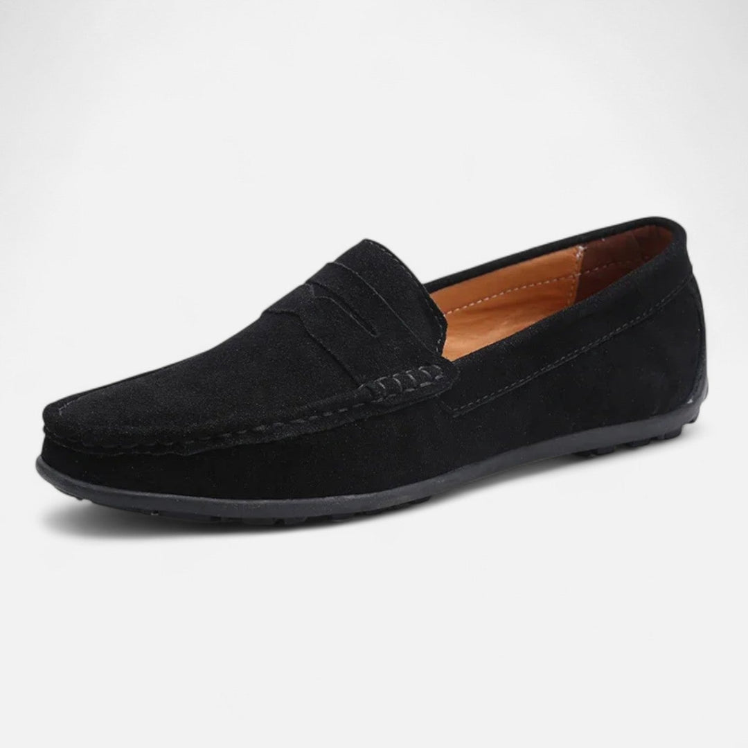 Men's penny loafer with moc toe stitching and low heel