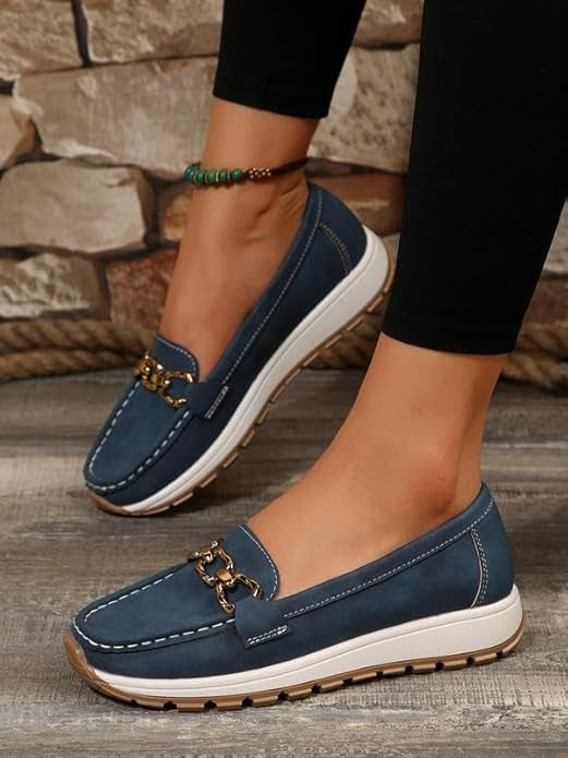 Women's flat loafers with metal buckle detail and round toes
