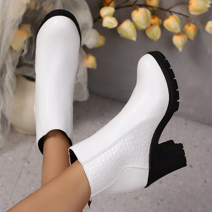Women's ankle boots with textured patterned panels and block heels