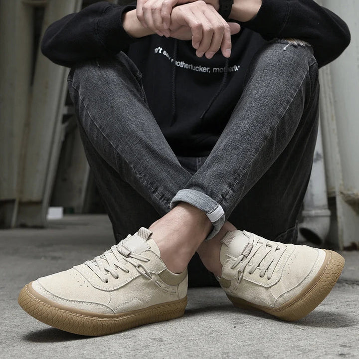 Men's low-top lace-up sneakers with textured rubber soles