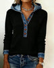 Women's black ribbed hooded top with denim trim