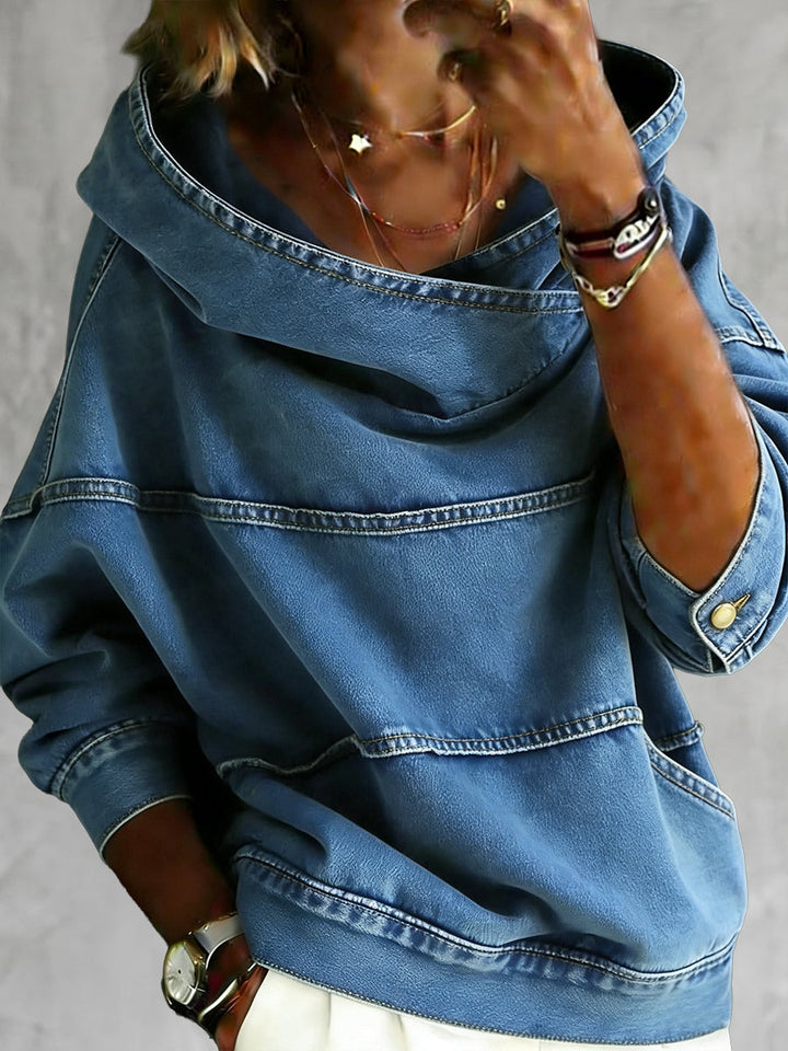Women's blue hooded sweatshirt with long sleeves, seam detailing and front pouch pocket