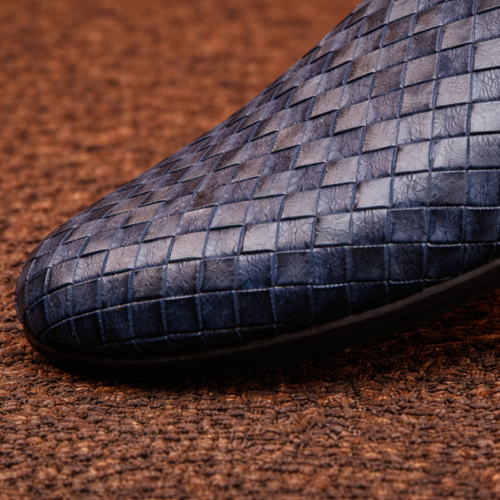 Woven slip-on loafers with a flat sole