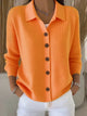 Women's collared knitted cardigan with long sleeves and button front