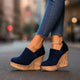 Women's platform wedge ankle booties with textured cork-look soles