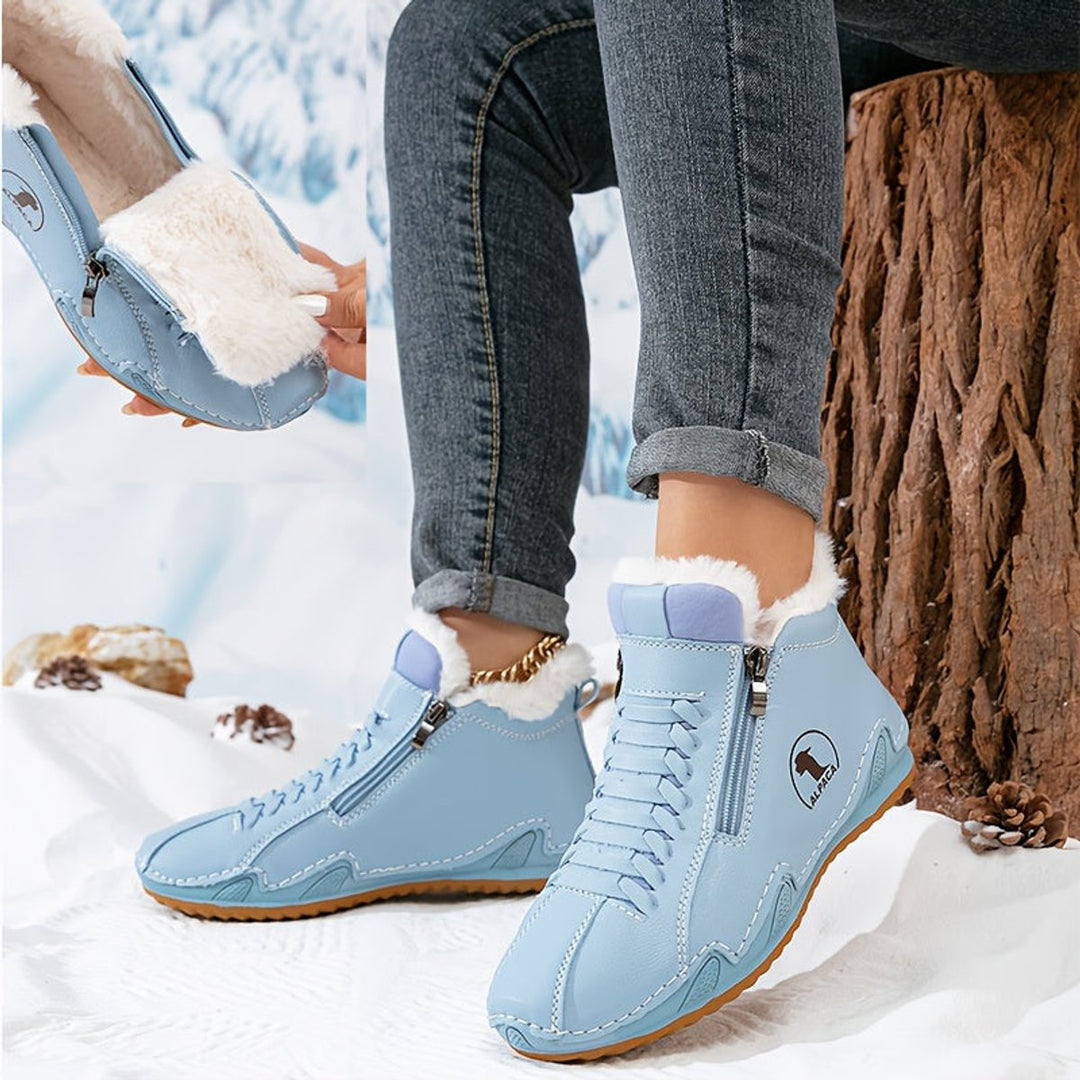Women's lined ankle boots with faux-fur trim and side zip
