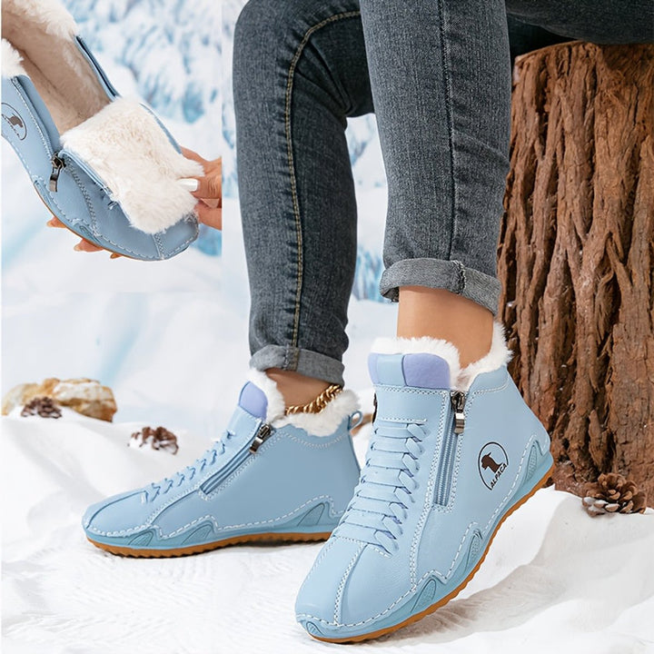 Women's lined ankle boots with faux-fur trim and side zip