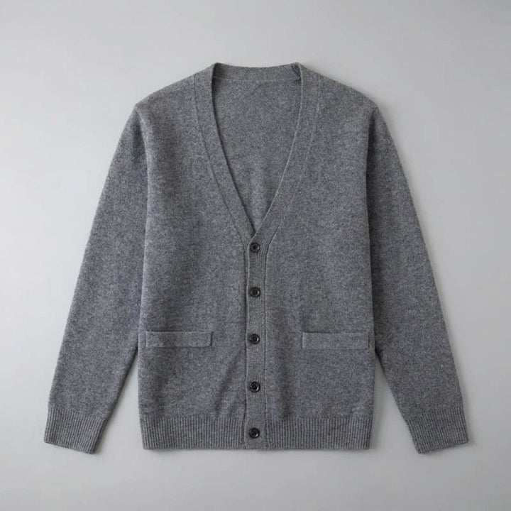 Unisex V-neck cardigan with long sleeves, button front and two patch pockets