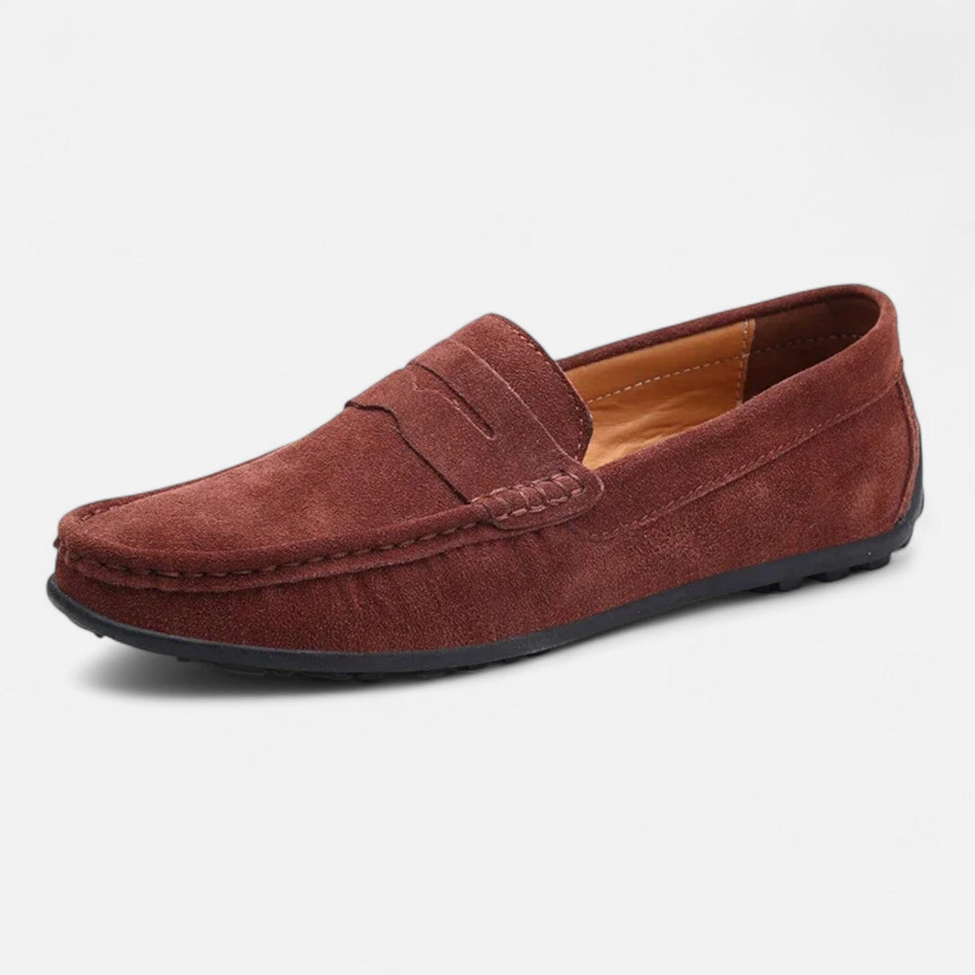 Men's penny loafer with moc toe stitching and low heel