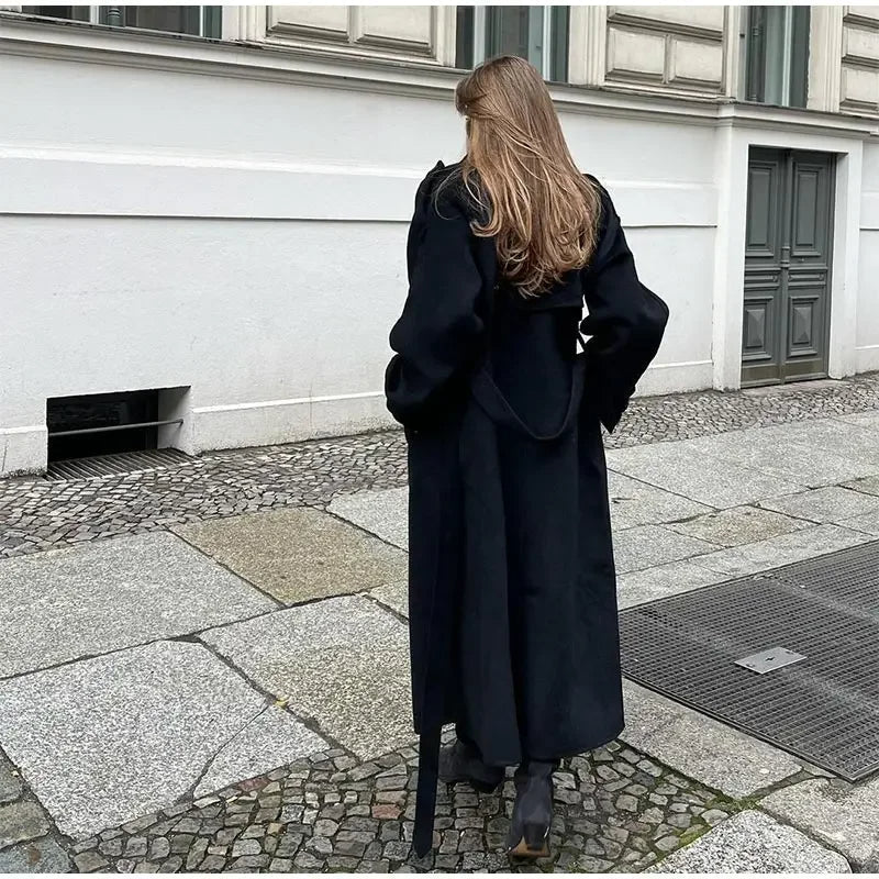 Women's black long oversized coat with wide lapels