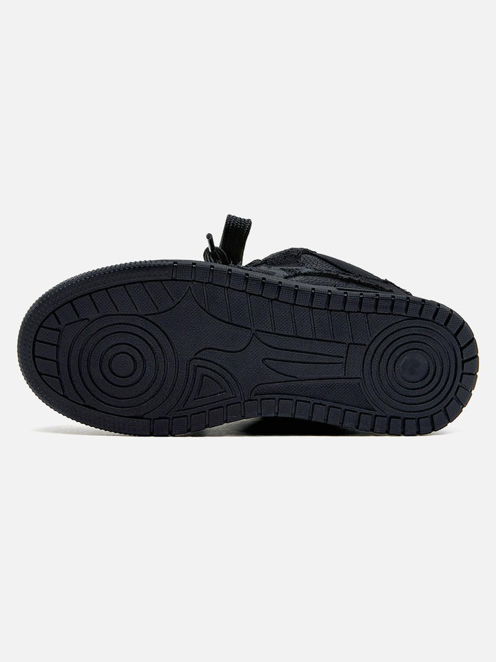 Black unisex high top trainers with lace-up fronts and camouflage panels