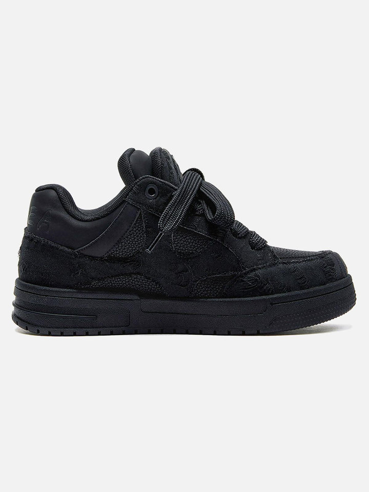 Black unisex high top trainers with lace-up fronts and camouflage panels