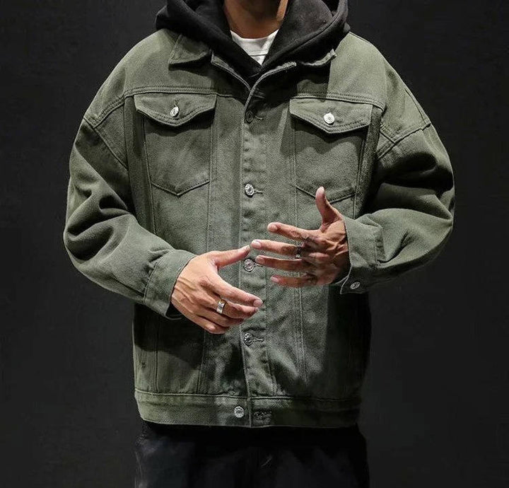 Men's button-front denim jacket with flap chest pockets and long sleeves