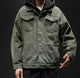 Men's button-front denim jacket with flap chest pockets and long sleeves