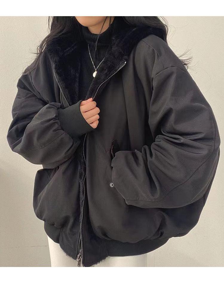 Women's reversible hooded jacket with zip front, gathered sleeves and ribbed hem
