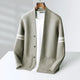 Men's button cardigan with contrasting striped sleeves and front pockets