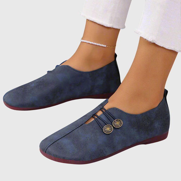Women's lace-up ballet flats with round toes and button details