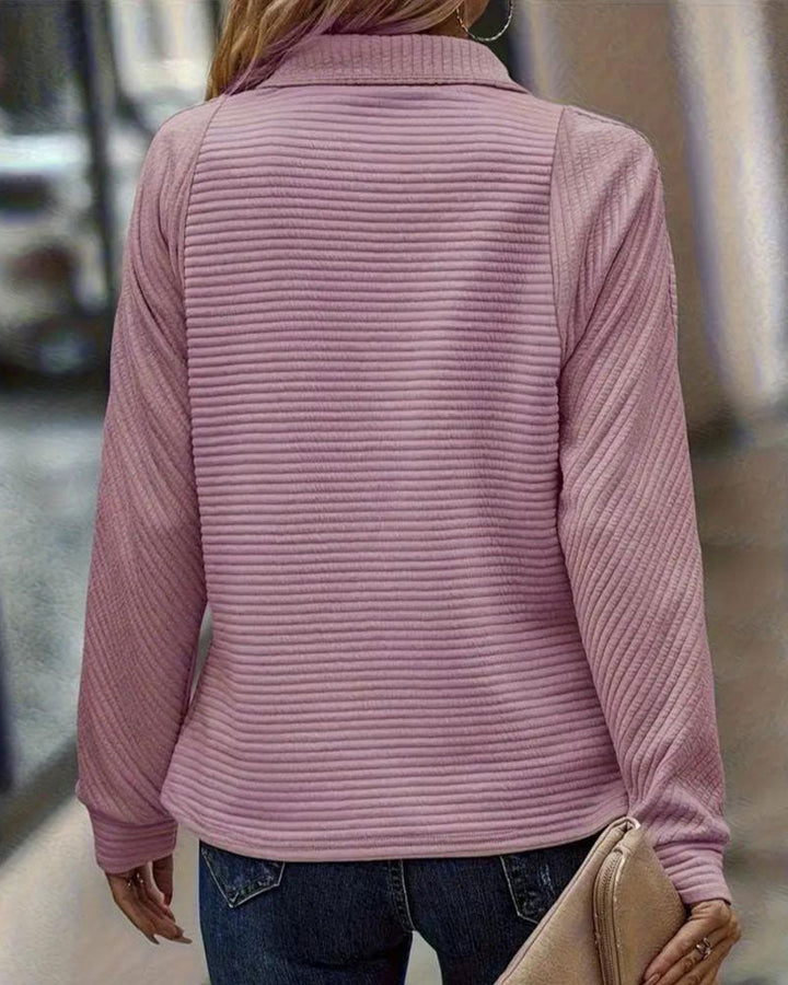 Women's textured quarter-zip sweatshirt with a high mock neck and long sleeves