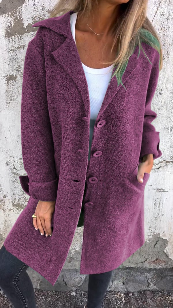 Women's long button-front coat with notched lapels and patch pockets