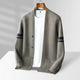 Men's button cardigan with contrasting striped sleeves and front pockets