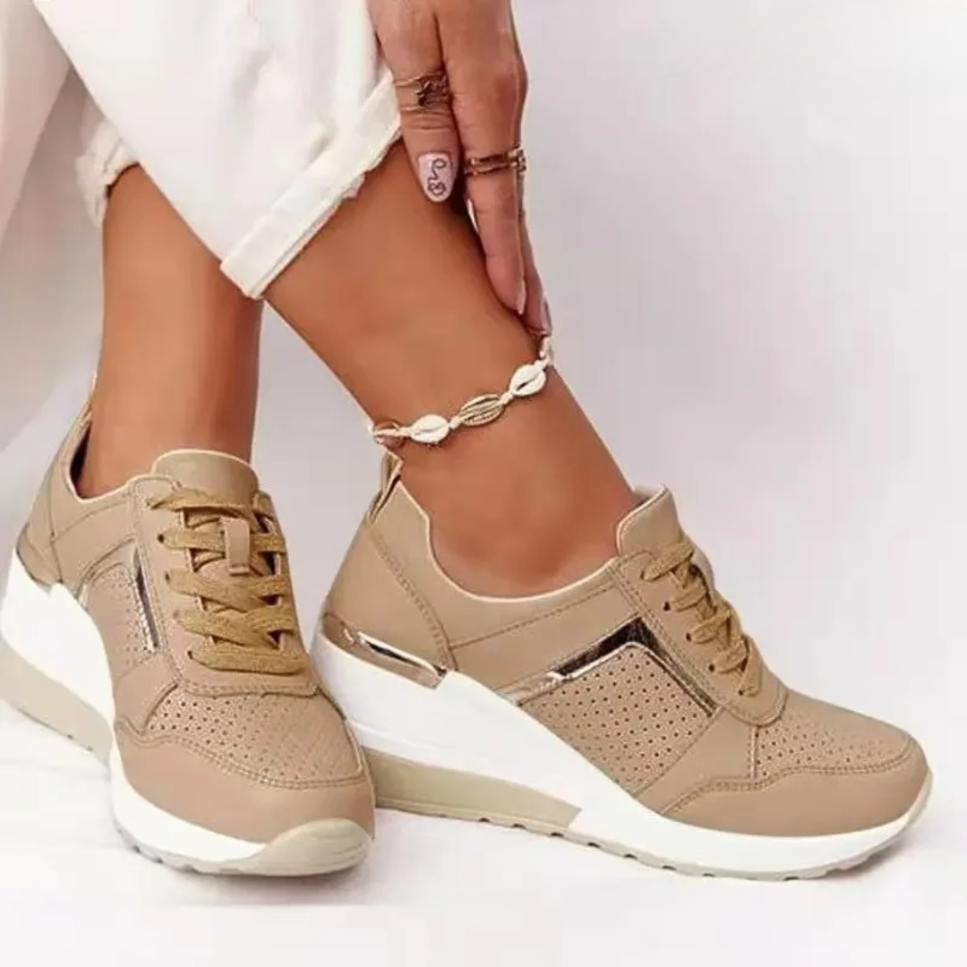 Women's platform trainers with lace-up fronts, perforated panels and metallic trims