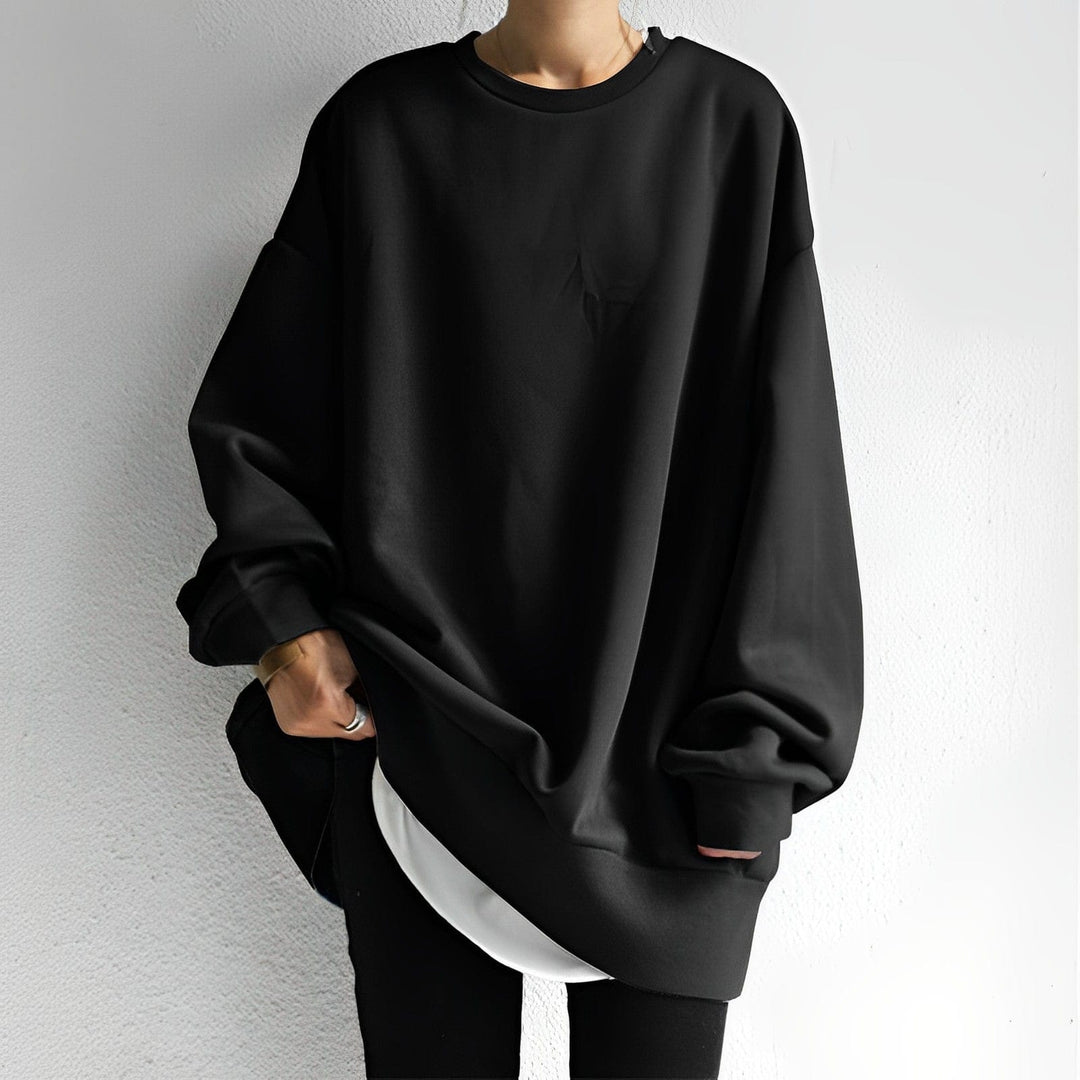 Women's oversized crew neck sweatshirt with long sleeves and curved hem