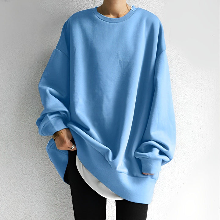 Women's oversized crew neck sweatshirt with long sleeves and curved hem