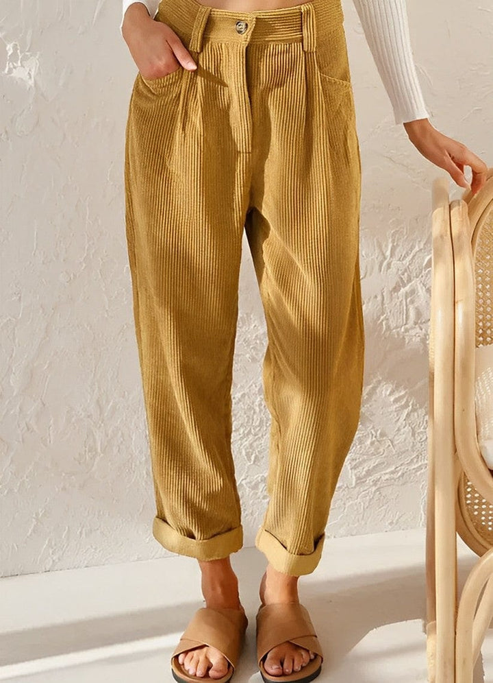 Women's high-waisted corduroy trousers with straight legs and turned-up cuffs