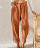 Women's high-waisted corduroy trousers with straight legs and turned-up cuffs