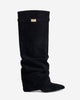 Women's black slouchy knee-high boots with pointed toes and buckle straps
