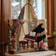 Women's quilted tote bag with illustrated floral and animal designs