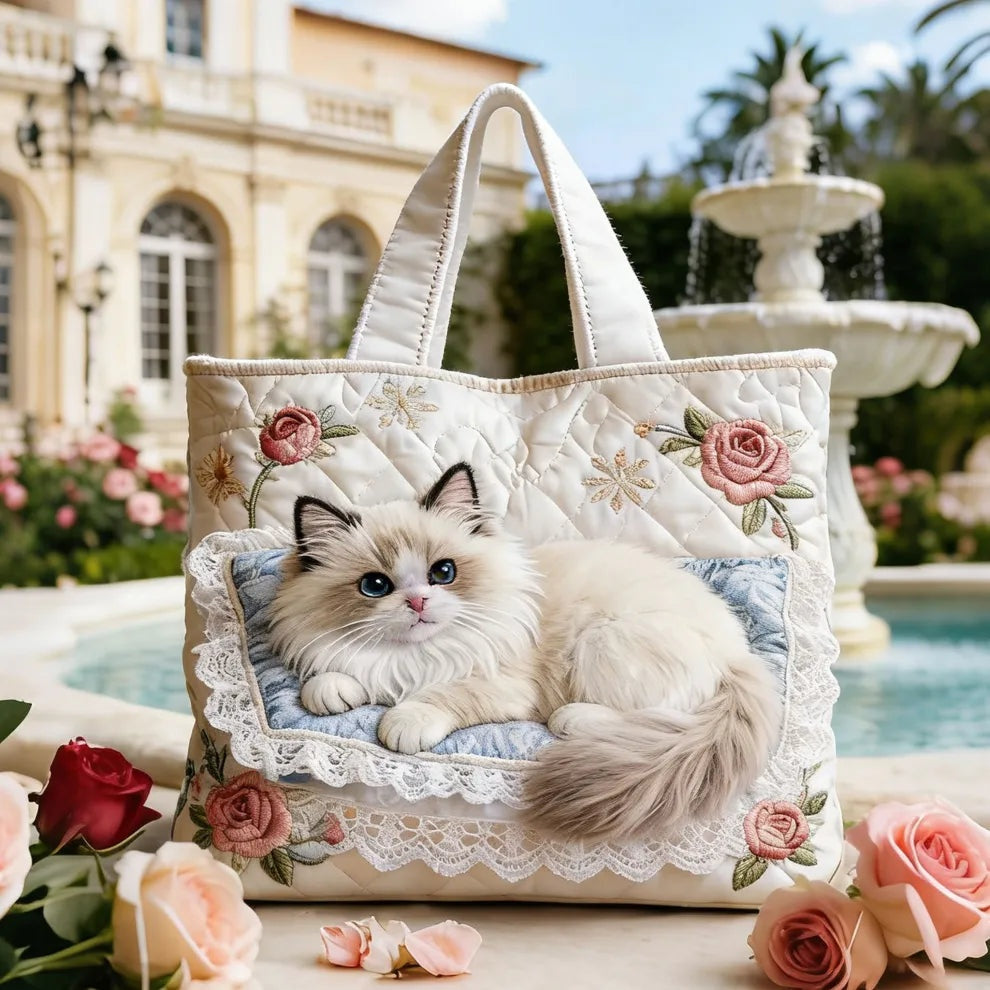 Women's quilted tote bag with illustrated floral and animal designs