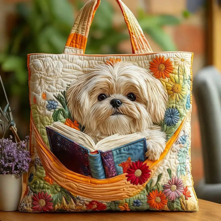 Women's quilted tote bag with illustrated floral and animal designs