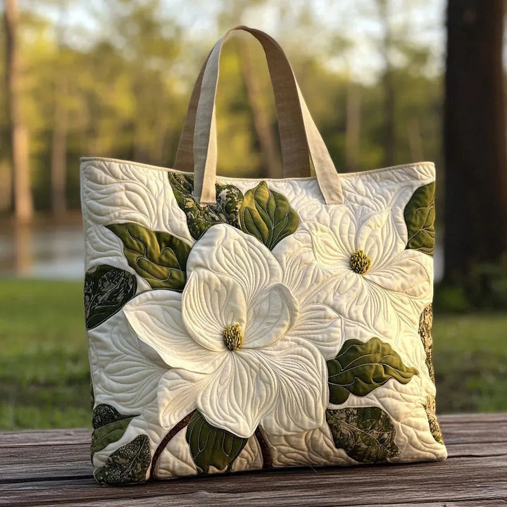 Women's quilted tote bag with illustrated floral and animal designs