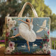 Women's quilted tote bag with illustrated floral and animal designs