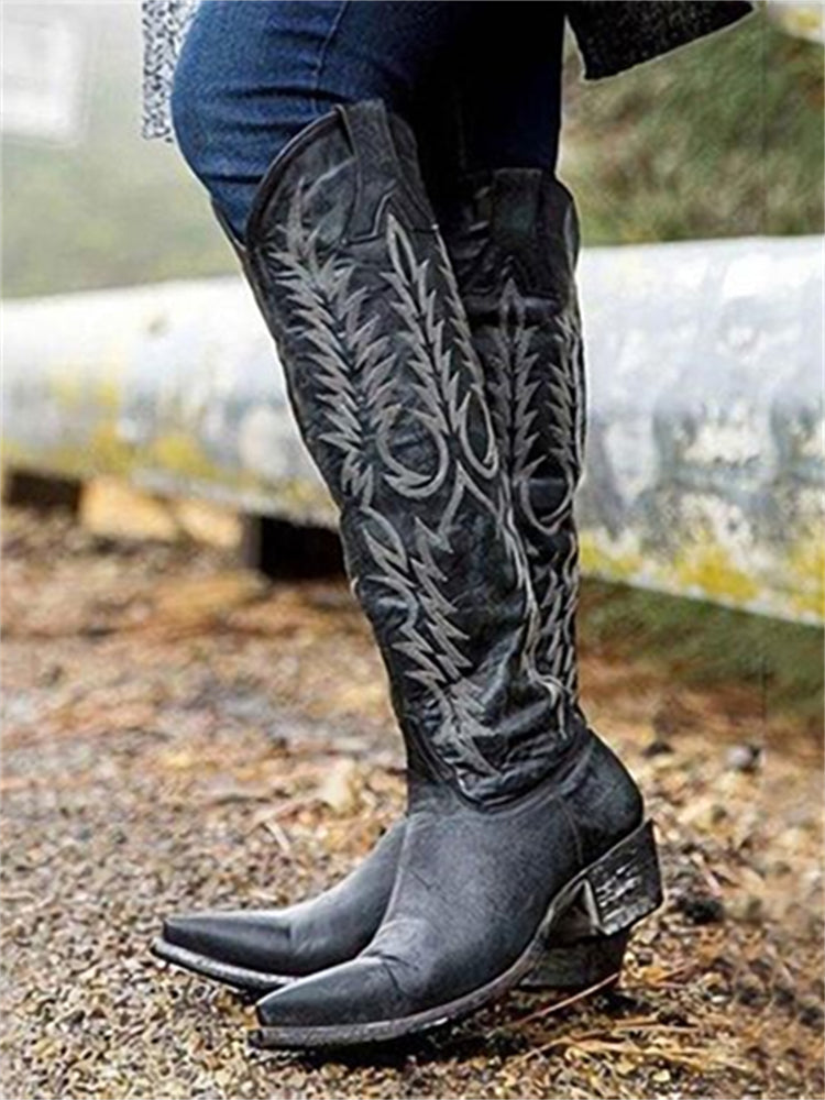 Women's knee-high cowboy boots with pointed toes and embroidered Western shaft detailing