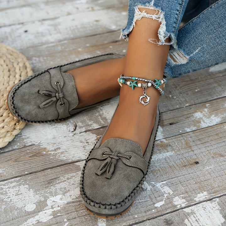 Classic loafer with tassel detail in grey suede with moccasin sole