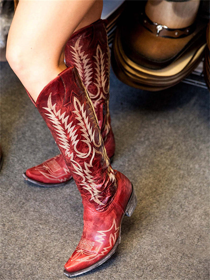 Women's knee-high cowboy boots with pointed toes and embroidered Western shaft detailing