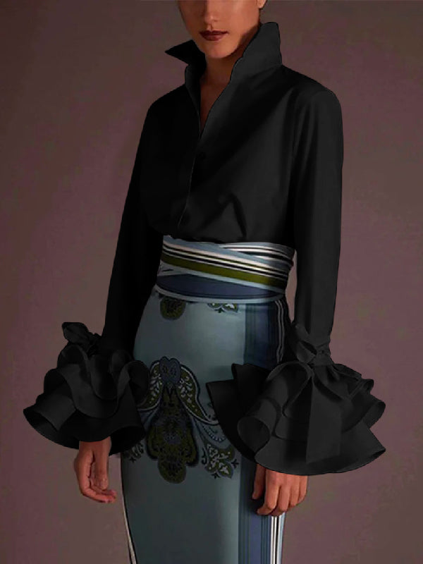 Women's solid blouse with raised collar, long sleeves, bow details and layered ruffle cuffs