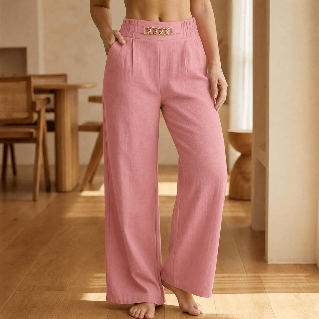 Women's wide leg trousers with elastic high waist, side pockets and gold chain accent