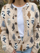 Women's cardigan with an all-over cat print, round neckline, long sleeves and button front