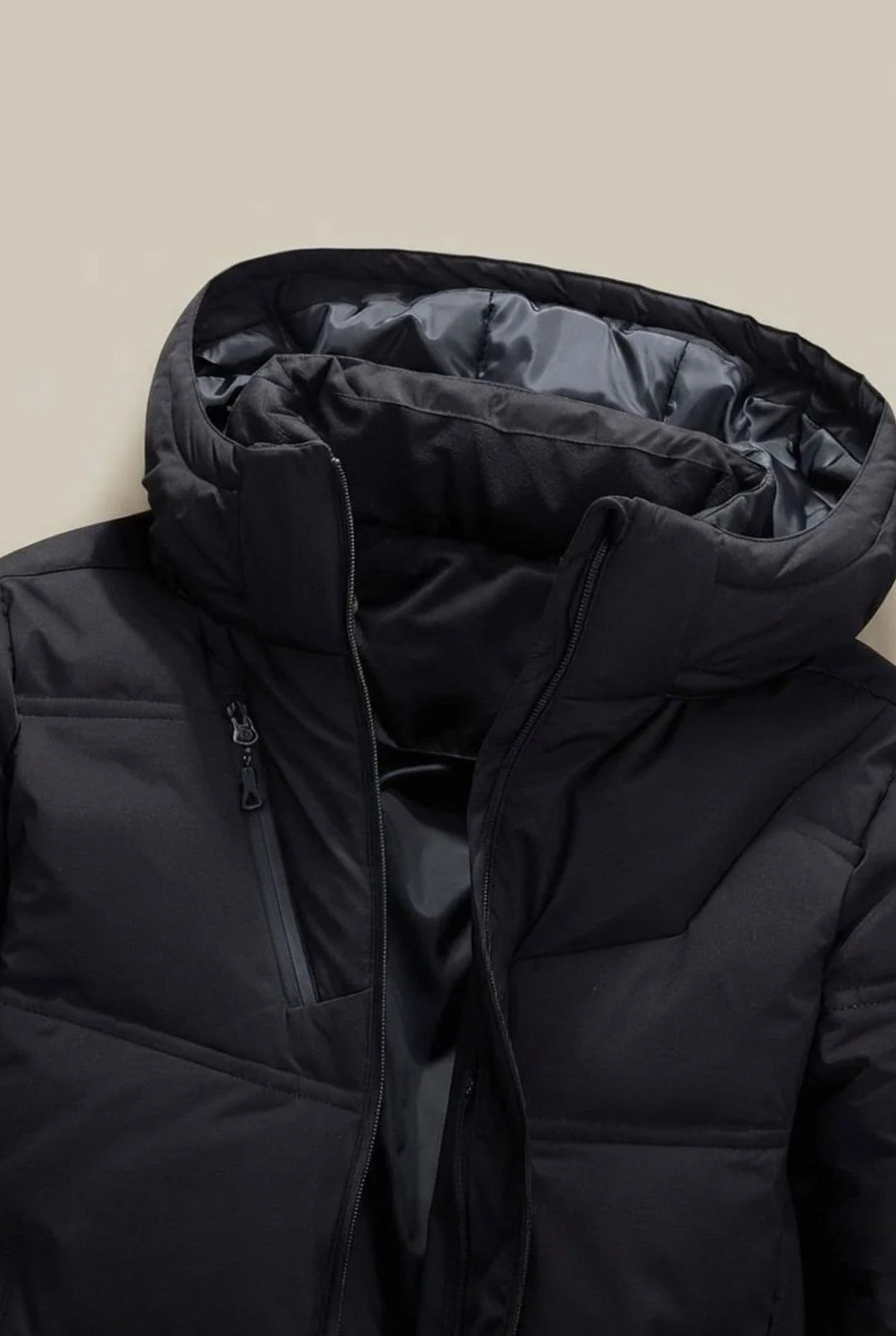 Men's hooded padded jacket with quilted panels and zipped pockets