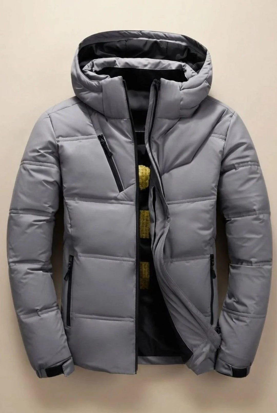 Men's hooded padded jacket with quilted panels and zipped pockets