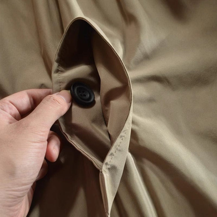 Men's single-breasted mid-length coat with pointed collar and button front