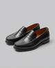 Men's slip-on penny loafers with moc-toe stitching and low heel