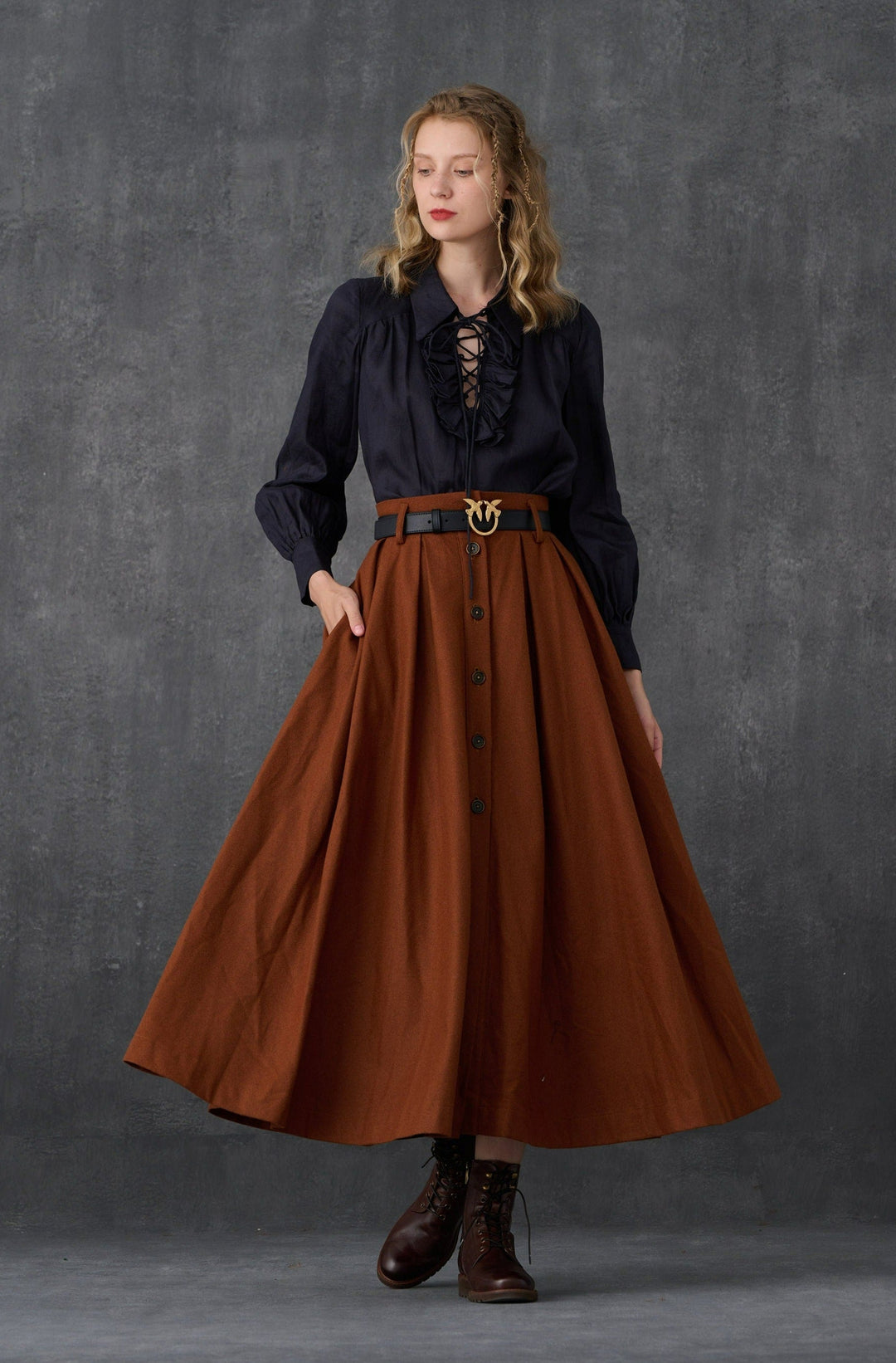 Women's brown button-front A-line midi skirt with belt