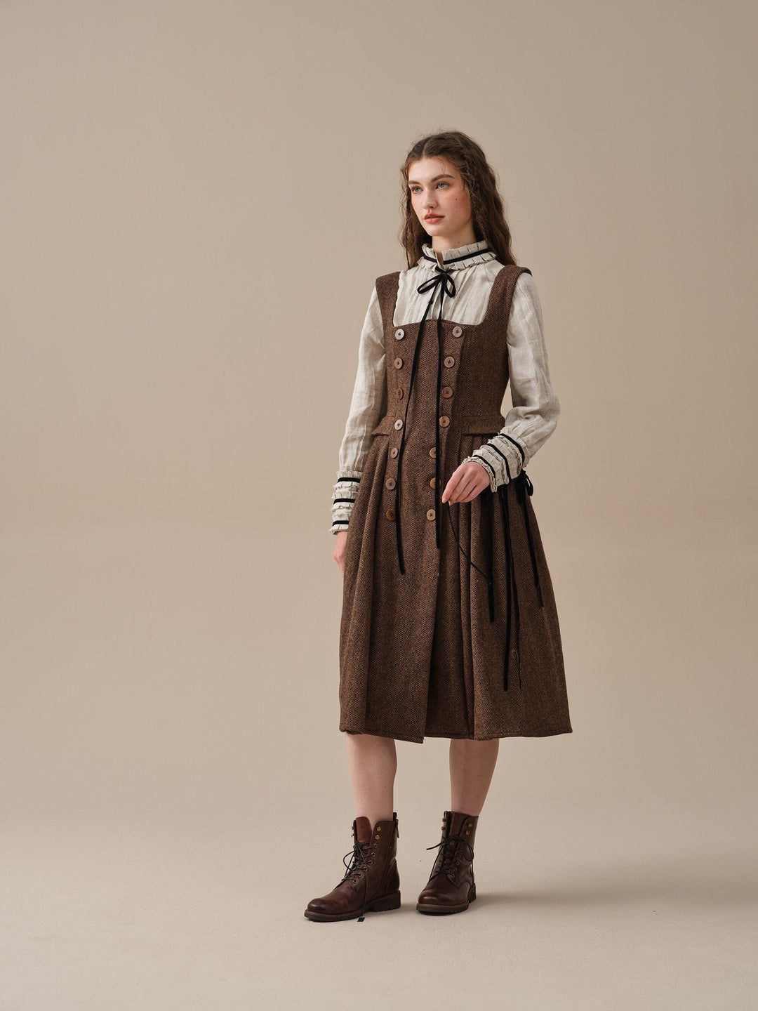Women's brown herringbone pinafore midi dress with buttons and belt