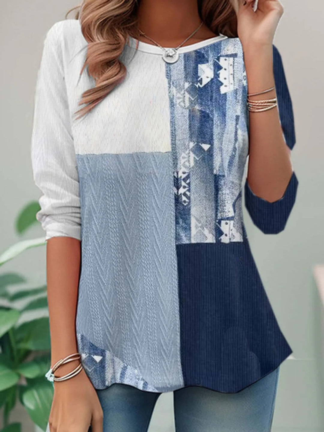 Women's patchwork sweatshirt with mixed pink, grey, blue and navy printed panels