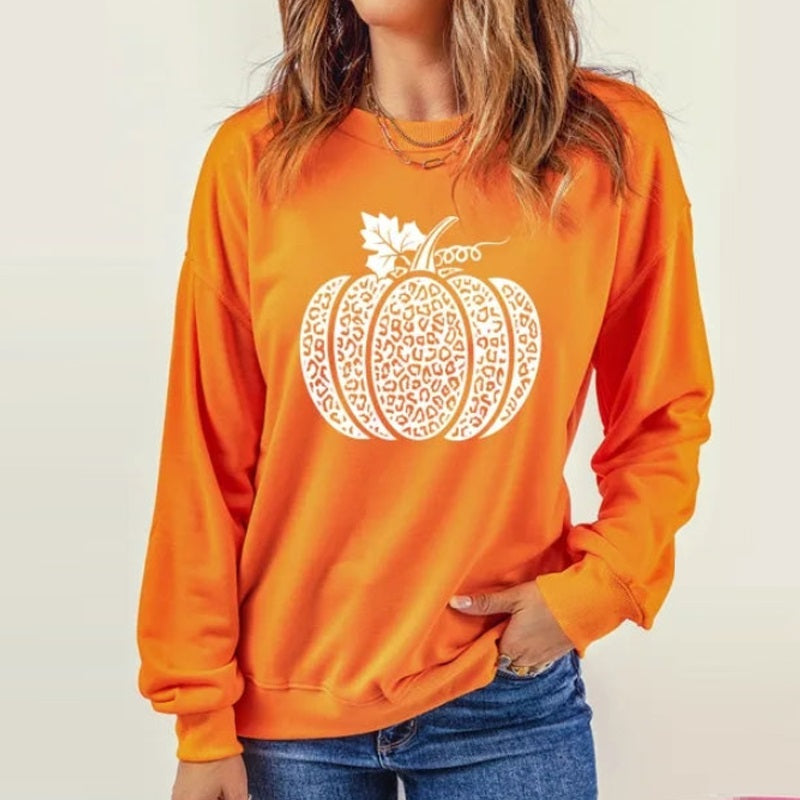 Women's orange sweatshirt with white pumpkin graphic, crew neck and long sleeves
