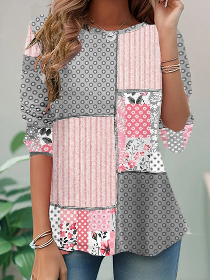 Women's patchwork sweatshirt with mixed pink, grey, blue and navy printed panels